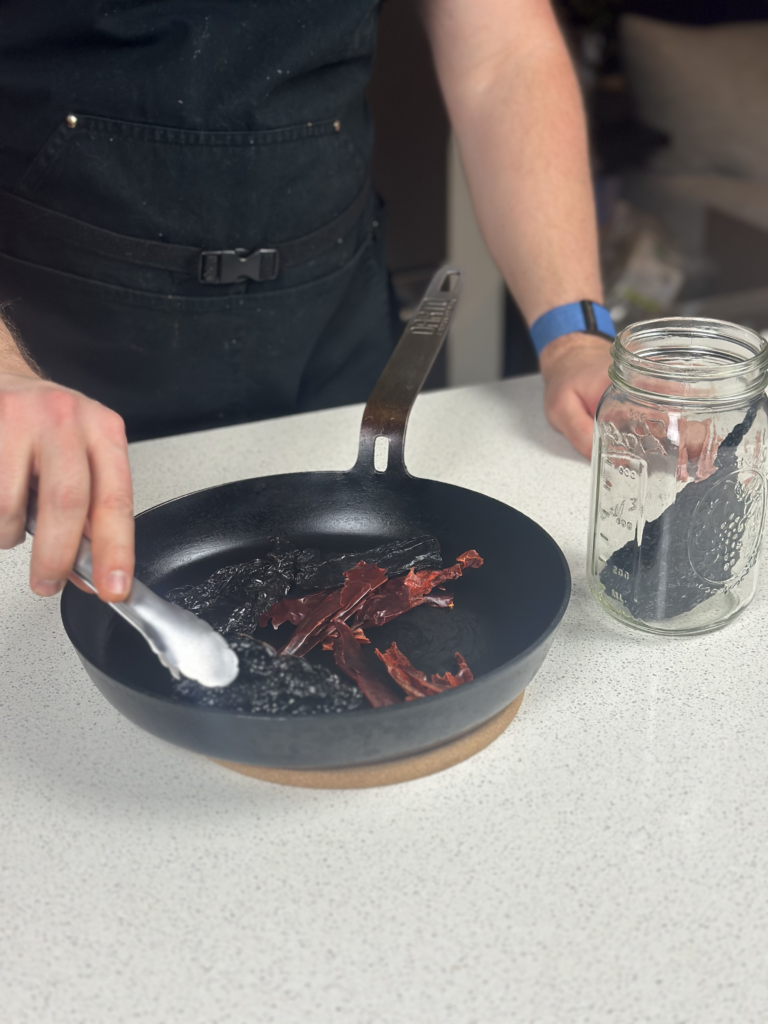 dry toasting chilis in a skillet