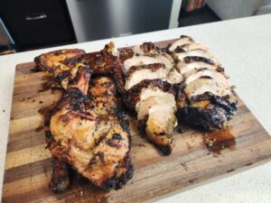 jerk chicken sliced on a cutting board