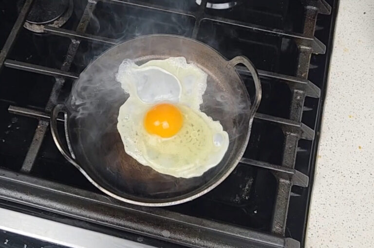Carbon Steel Pan Seasoned Cooking an Egg